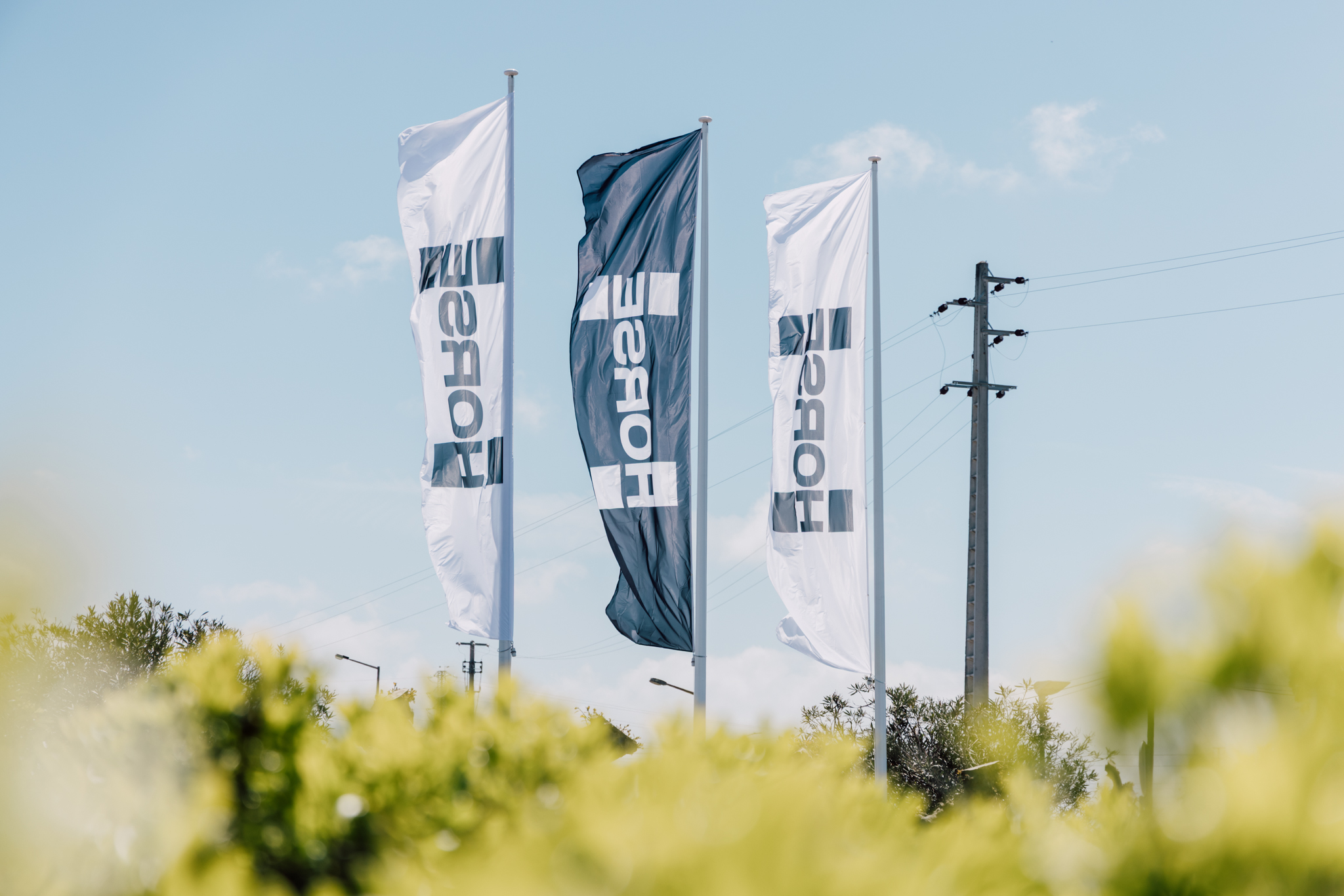 Horse Powertrain logo flags in the breeze outside