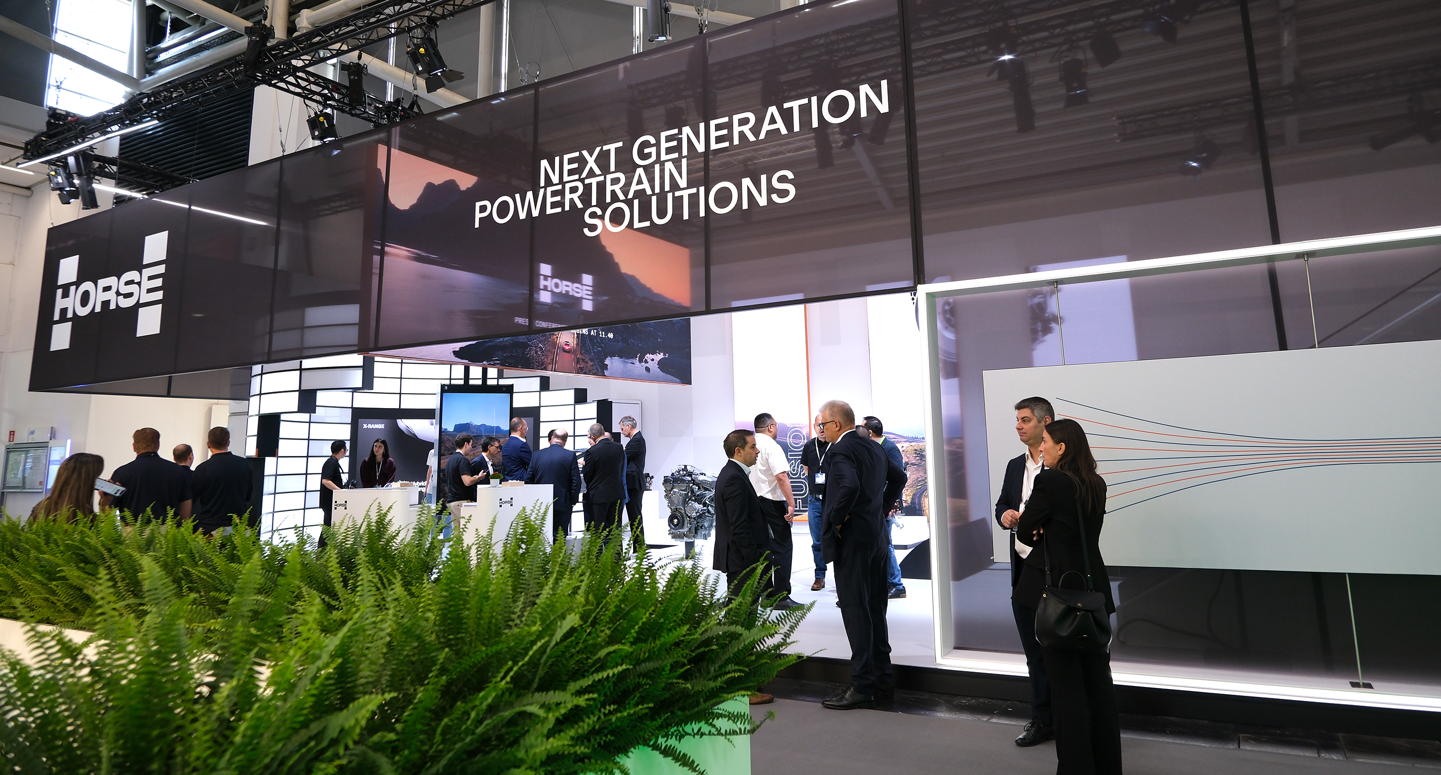 a lot of people in Horse Powertrains booth at IAA Mobility