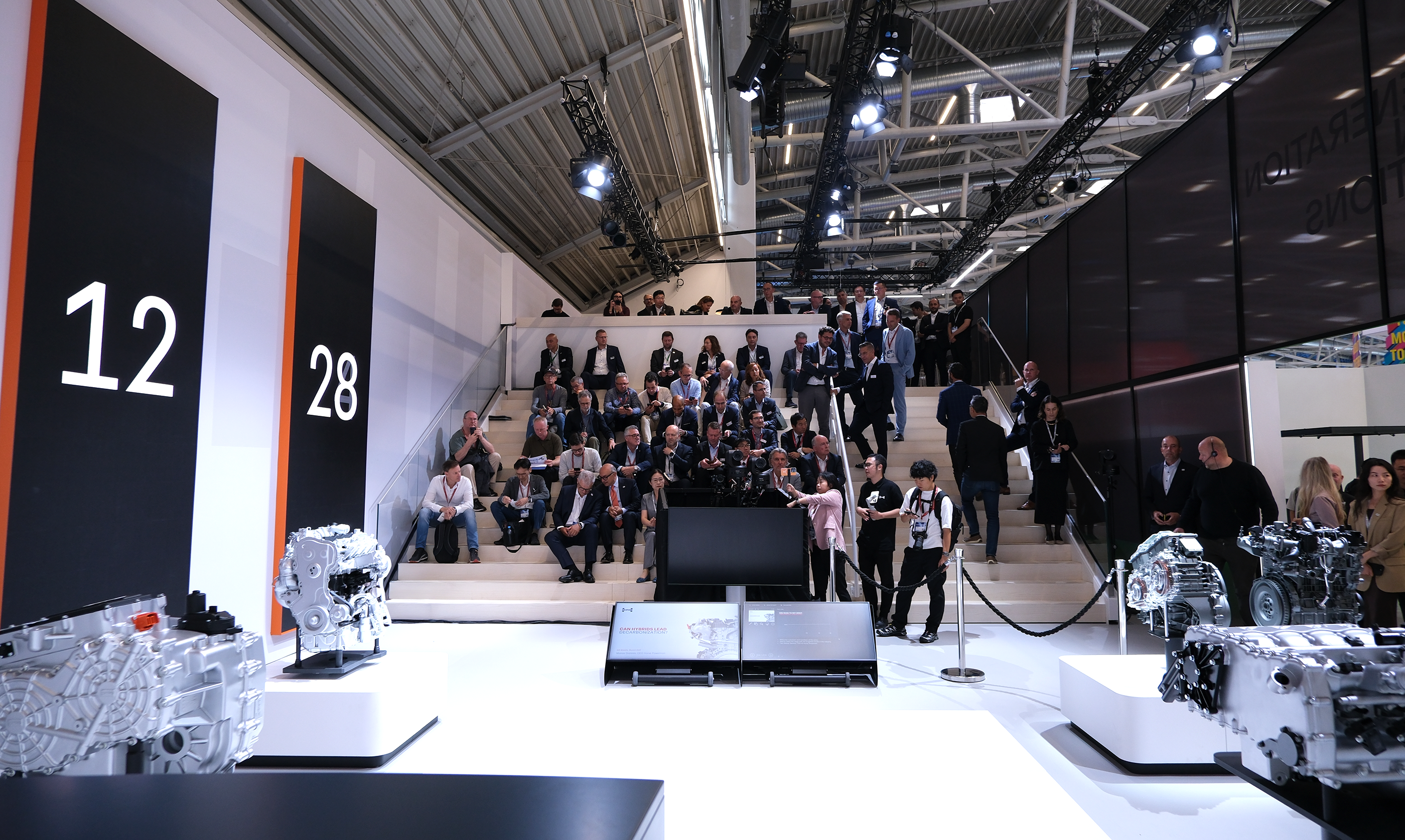 Press conference with a lot of people on the stands