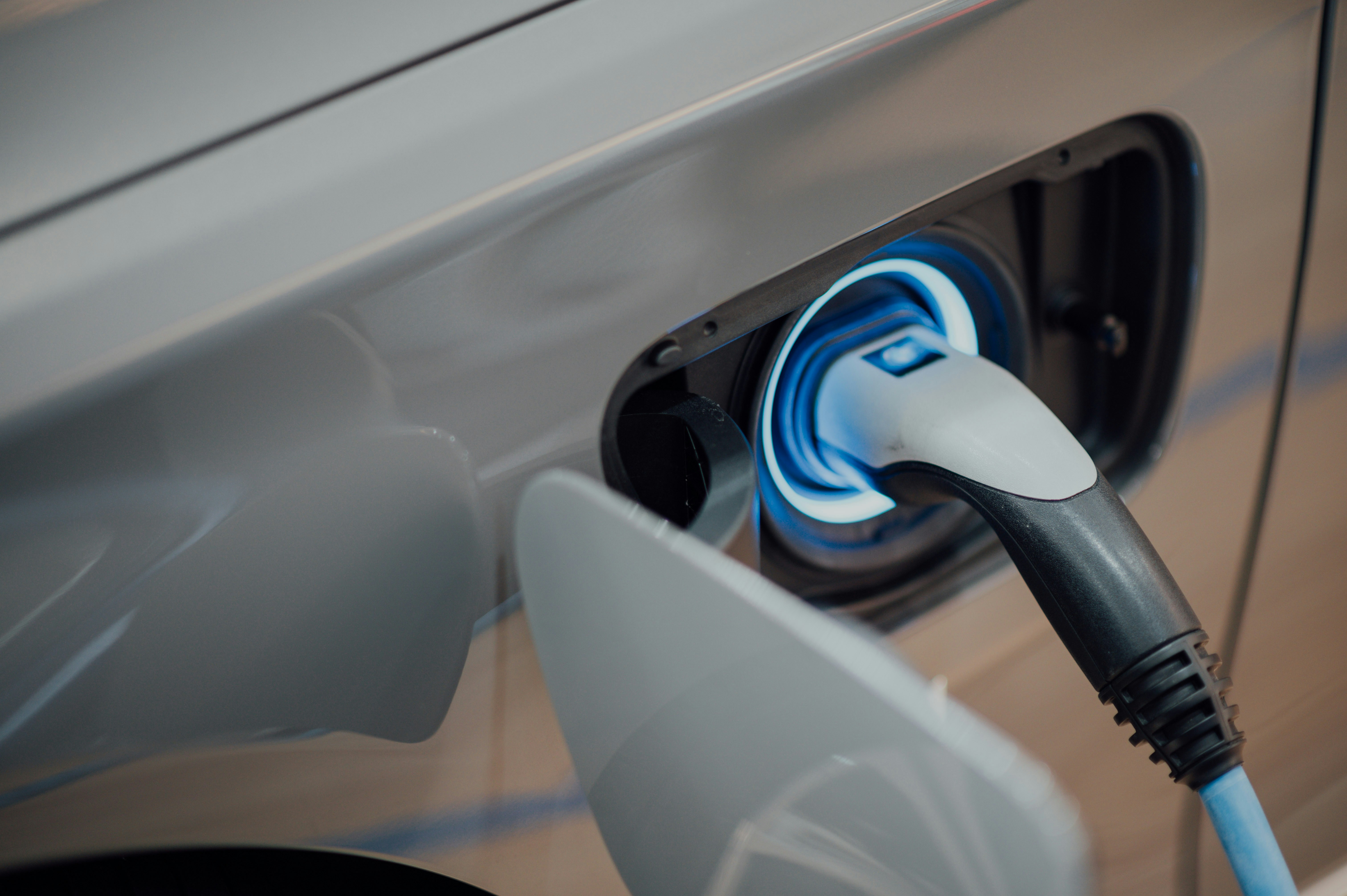 A close-up of an electric vehicle charging