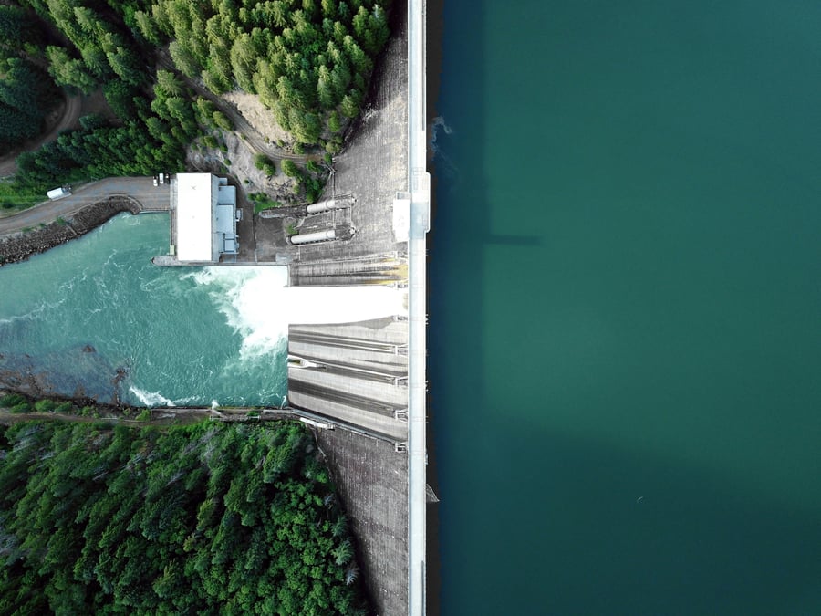 An aerial view of a dam and neighbouring reservoir