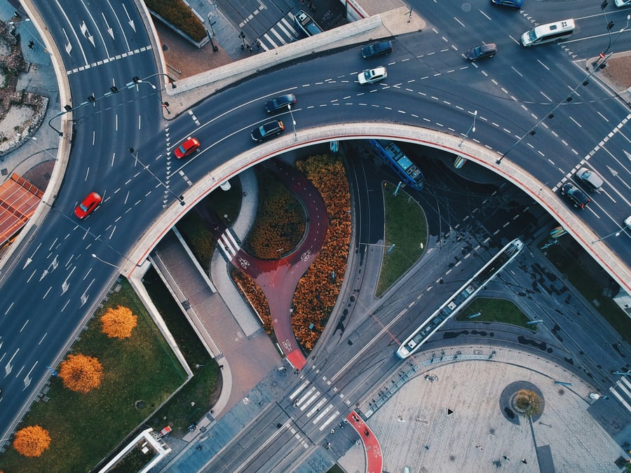 An aerial view of a motorway junction in an urban area