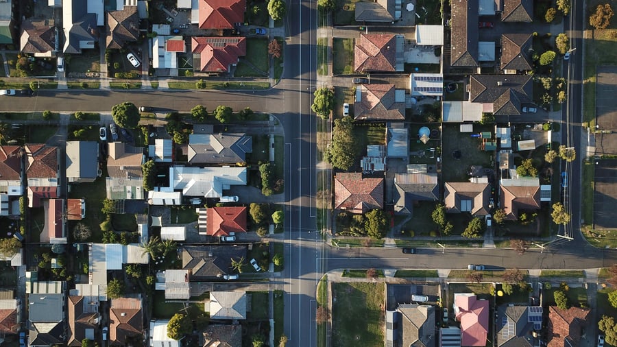 An aerial view of a suburban neighbourhood and streets